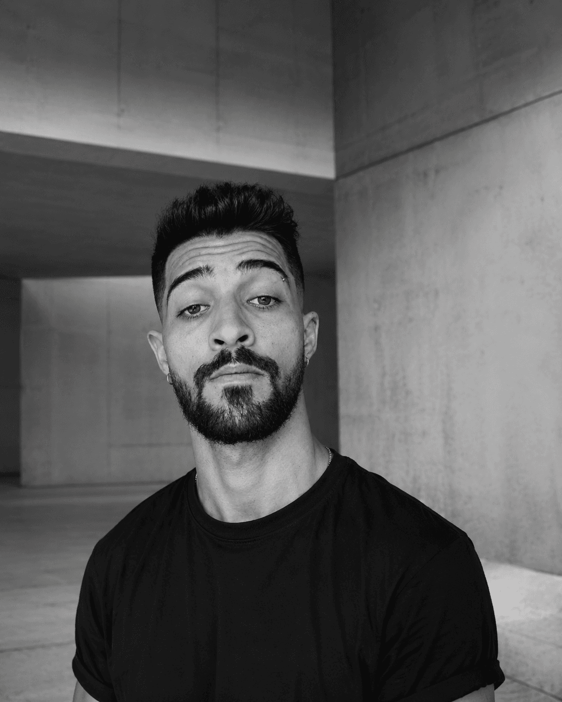 Rhuan Lucas in an architectural concrete space